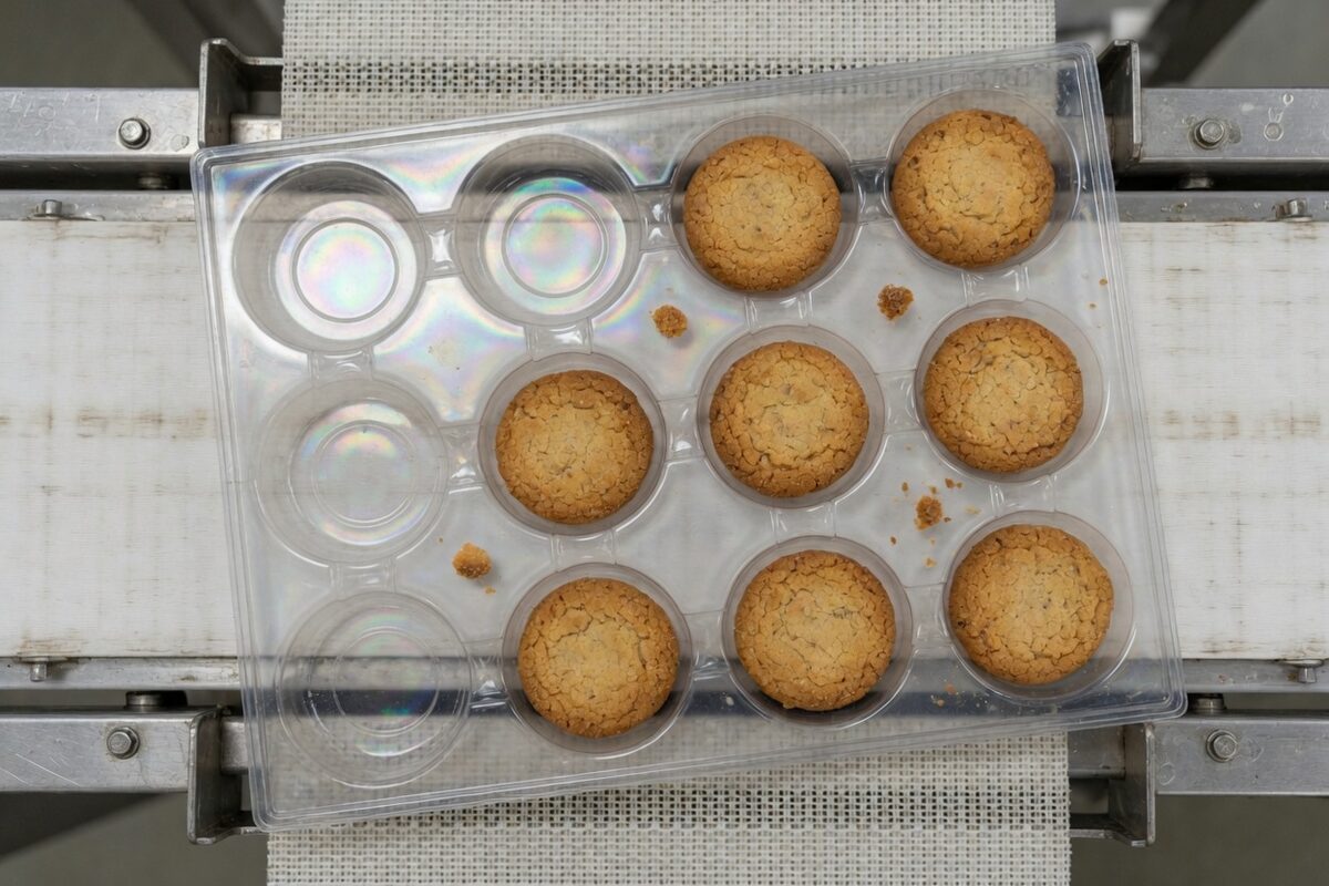 A tray of cookies with empty pockets