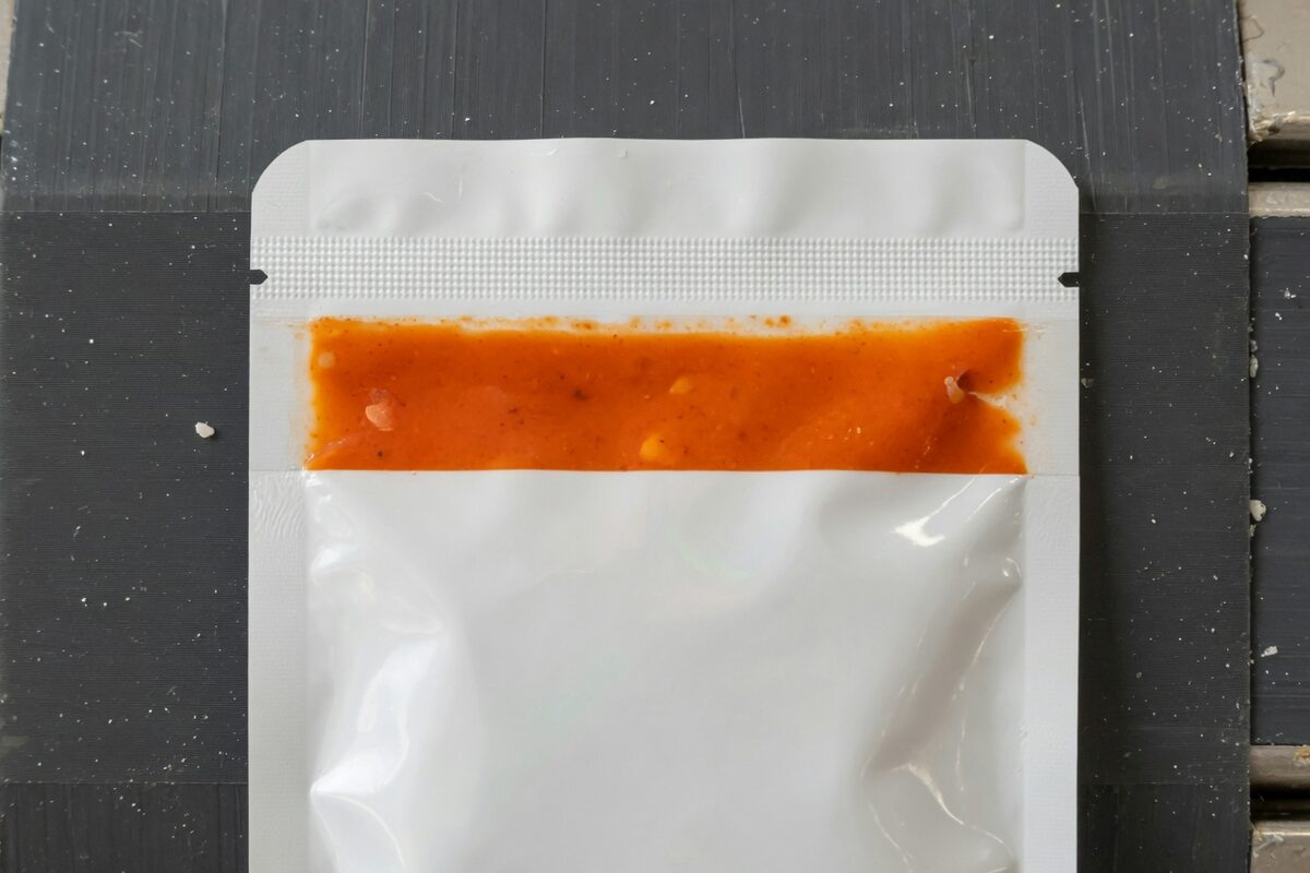 A white pouch with the seam closed