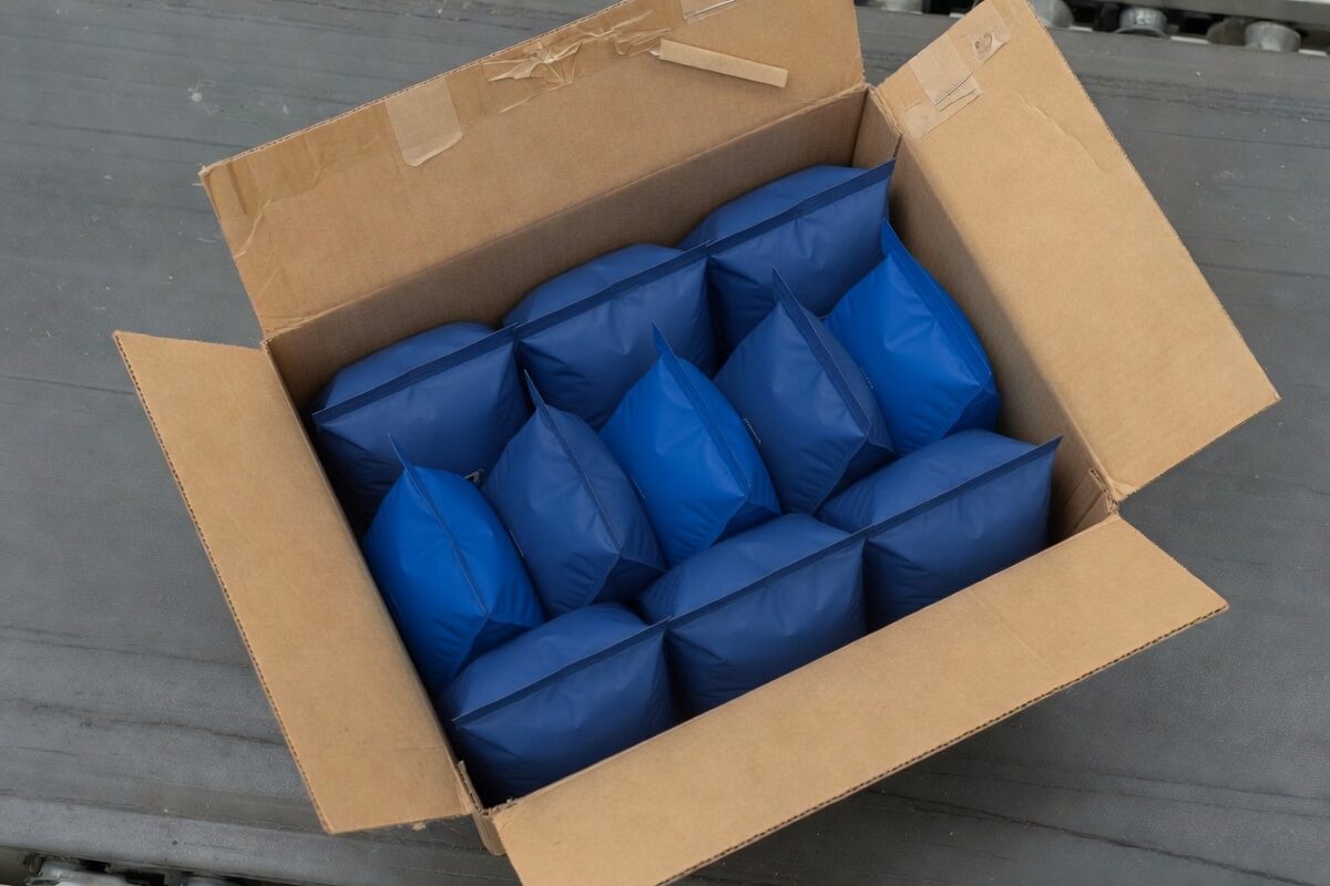 An open case packed only with blue pouches
