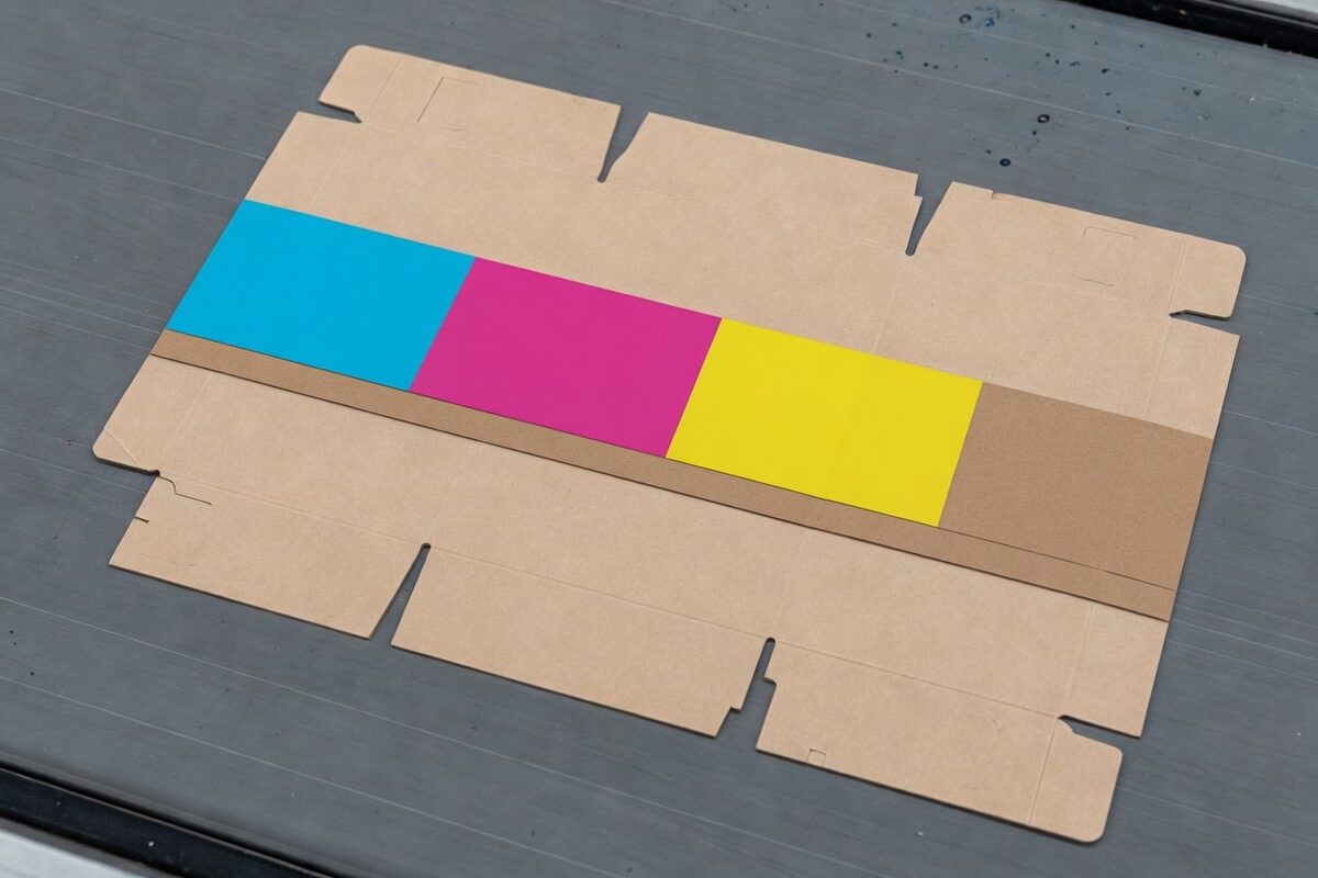 A brown carton with the color band shifted up and a bare patch of board